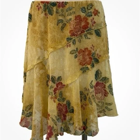 FREE PEOPLE assymetrical floral skirt. Like new!
Size L - Picture 2 of 2